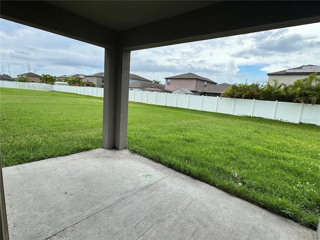 4448 Globe Thistle, Tampa, FL 33619 - view of yard featuring a patio area