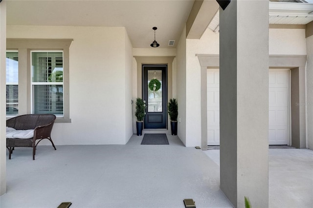 7420 Paradiso Dr, Apollo Beach, FL 33572 - view of exterior entry featuring stucco siding