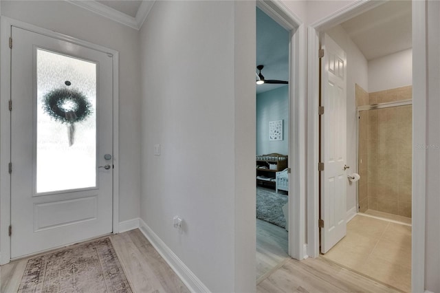 7420 Paradiso Dr, Apollo Beach, FL 33572 - foyer entrance with crown molding and light wood finished floors