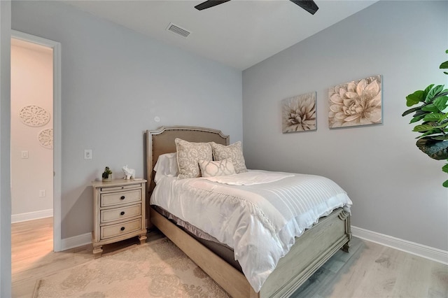 7420 Paradiso Dr, Apollo Beach, FL 33572 - bedroom featuring light wood-style floors and a ceiling fan