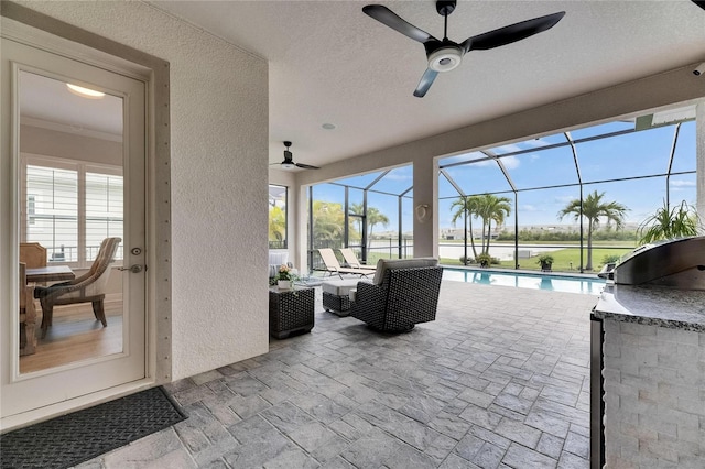 7420 Paradiso Dr, Apollo Beach, FL 33572 - view of patio featuring ceiling fan, an outdoor hangout area, an outdoor pool, a lanai, and area for grilling