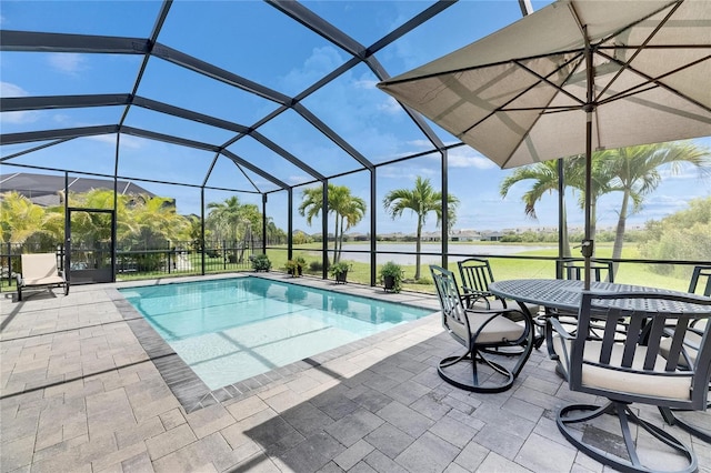 7420 Paradiso Dr, Apollo Beach, FL 33572 - outdoor pool featuring a patio, a water view, and a lanai