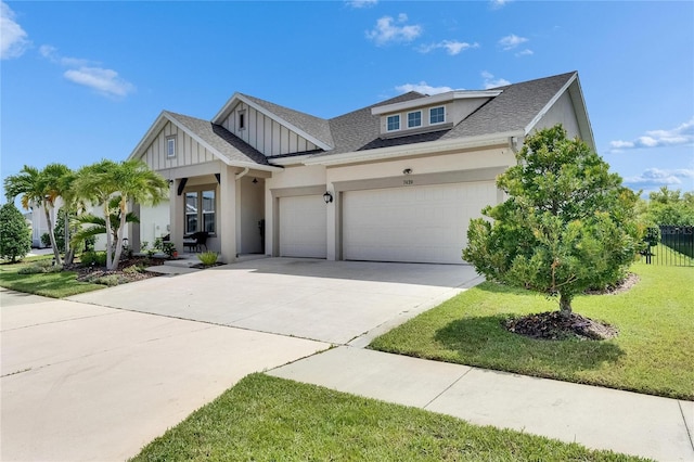 7420 Paradiso Dr, Apollo Beach, FL 33572 - view of front facade with a garage, driveway, board and batten siding, roof with shingles, and a porch