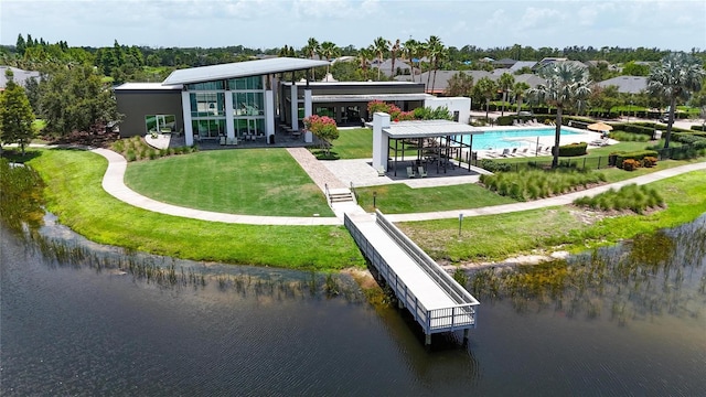 7420 Paradiso Dr, Apollo Beach, FL 33572 - rear view of property with a water view, a lawn, and a patio area