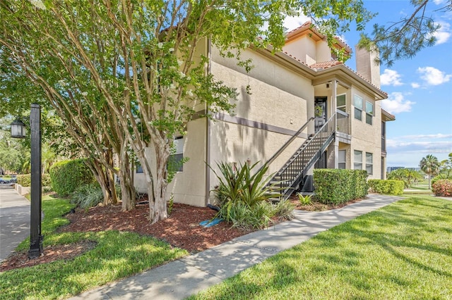 2400 Feather Sound Dr Unit 528, Clearwater, FL 33762 - view of building exterior featuring stairway