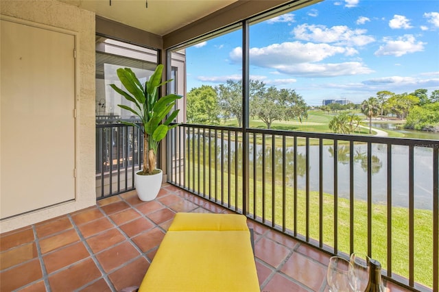 2400 Feather Sound Dr Unit 528, Clearwater, FL 33762 - unfurnished sunroom featuring a water view