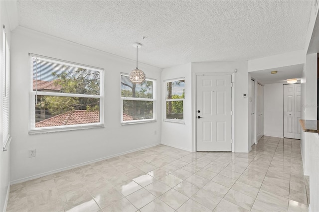 2400 Feather Sound Dr Unit 528, Clearwater, FL 33762 - unfurnished dining area featuring a textured ceiling