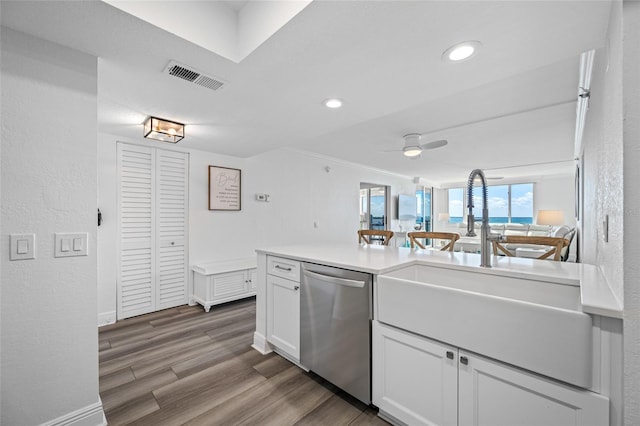 6372 Palma Del Mar Blvd S Unit 601, Saint Petersburg, FL 33715 - kitchen featuring stainless steel dishwasher, ceiling fan, dark wood finished floors, white cabinets, and recessed lighting