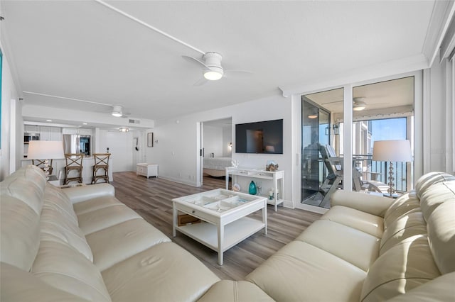 6372 Palma Del Mar Blvd S Unit 601, Saint Petersburg, FL 33715 - living room with ceiling fan and wood finished floors
