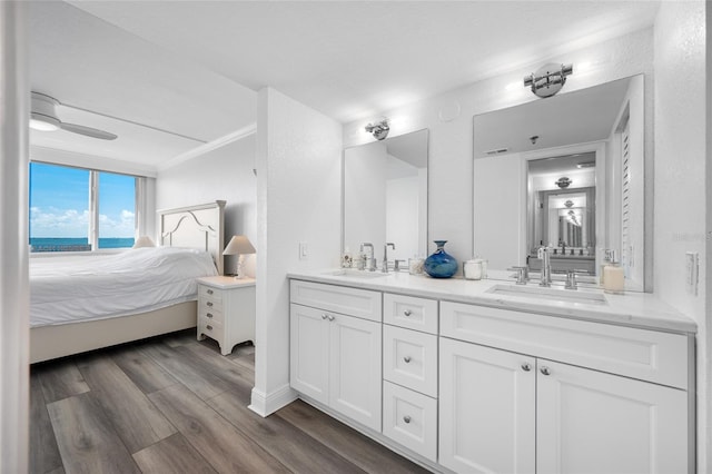 6372 Palma Del Mar Blvd S Unit 601, Saint Petersburg, FL 33715 - full bathroom with connected bathroom, double vanity, and wood finished floors