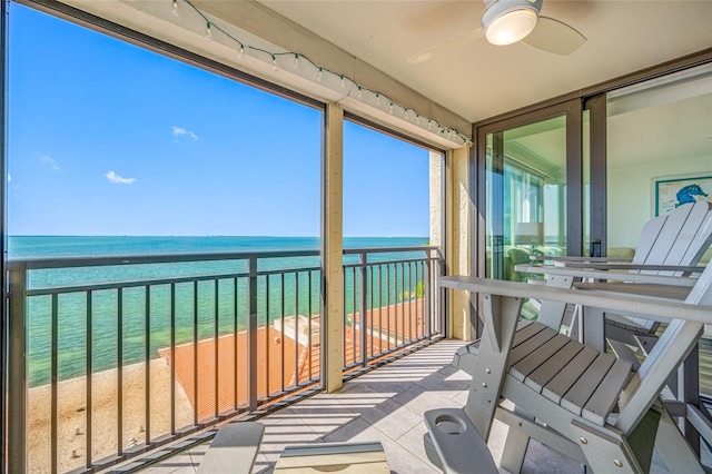 6372 Palma Del Mar Blvd S Unit 601, Saint Petersburg, FL 33715 - balcony featuring view of water and beach and a ceiling fan