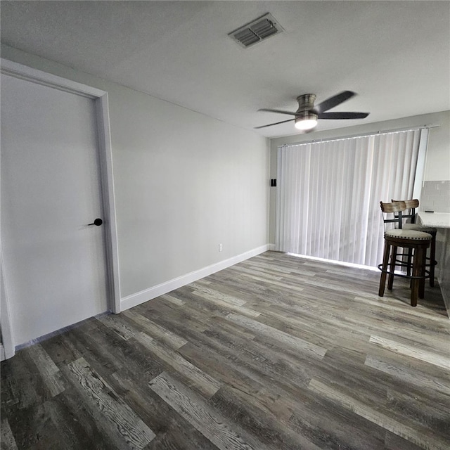 6008 Firefly Ln, Apollo Beach, FL 33572 - spare room with wood finished floors and a ceiling fan
