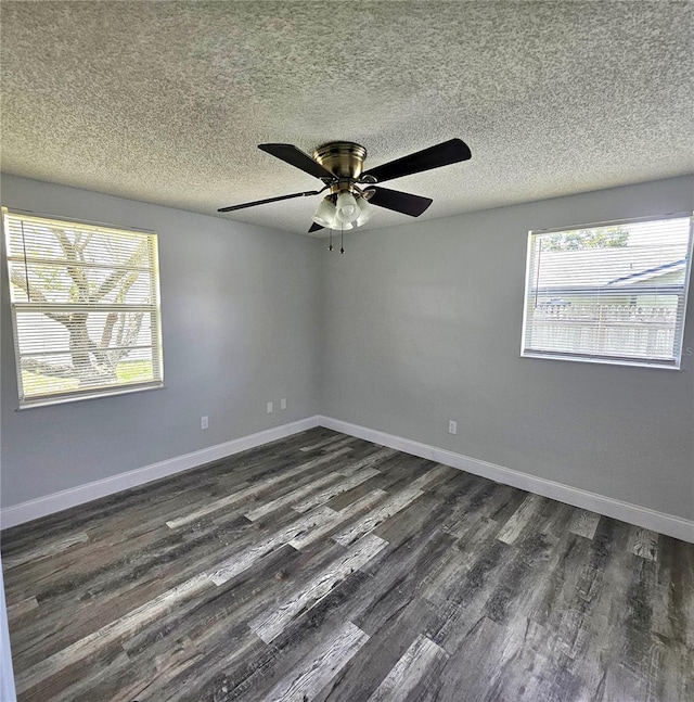6008 Firefly Ln, Apollo Beach, FL 33572 - empty room featuring dark wood-style floors, healthy amount of natural light, a textured ceiling, and ceiling fan
