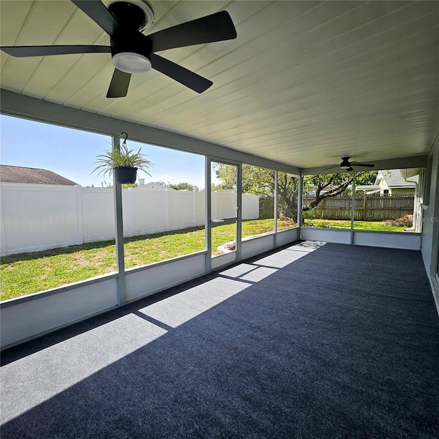 6008 Firefly Ln, Apollo Beach, FL 33572 - unfurnished sunroom featuring ceiling fan