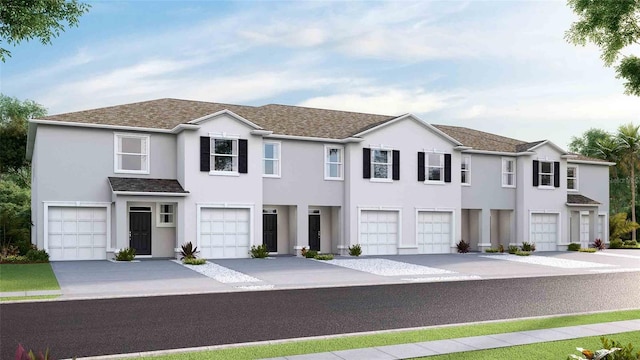 583 Mangrove Shade Cir, Apollo Beach, FL 33572 - multi unit property featuring a garage, stucco siding, and concrete driveway