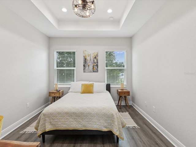 2809 N 21st St, Tampa, FL 33605 - bedroom with multiple windows, dark wood-style flooring, a raised ceiling, and recessed lighting