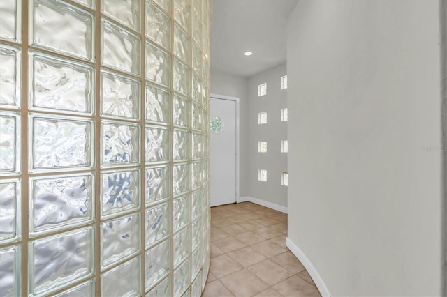 3412 W San Juan St Unit A, Tampa, FL 33629 - hallway featuring light tile patterned floors and baseboards