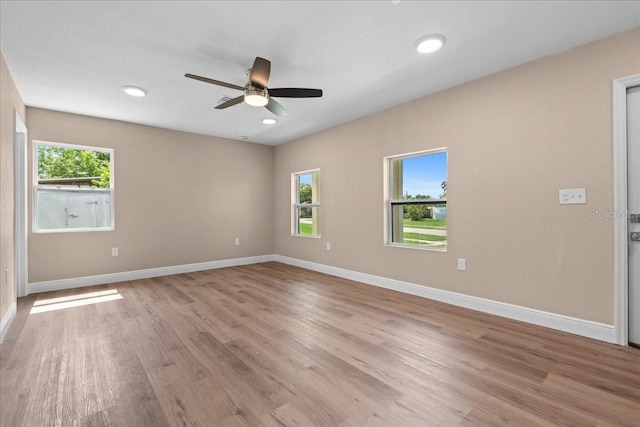 21536 Holdern Ave, Port Charlotte, FL 33952 - unfurnished room with a ceiling fan, light wood-style floors, baseboards, and recessed lighting
