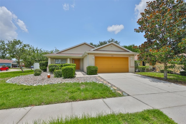 11415 Bright Star Ln, Riverview, FL 33569 - ranch-style house featuring a garage, stucco siding, driveway, and a front lawn