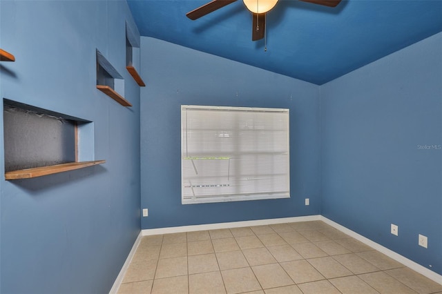 11415 Bright Star Ln, Riverview, FL 33569 - tiled empty room featuring ceiling fan, lofted ceiling, and baseboards