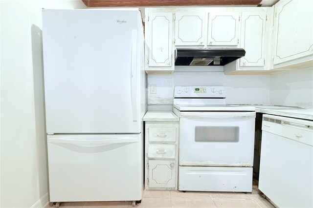 101 Cambridge Trl Unit 194, Sun City Center, FL 33573 - kitchen featuring white appliances, range hood, white cabinets, and light countertops