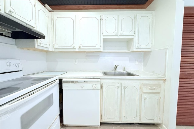 101 Cambridge Trl Unit 194, Sun City Center, FL 33573 - kitchen with white appliances, under cabinet range hood, a sink, and light countertops