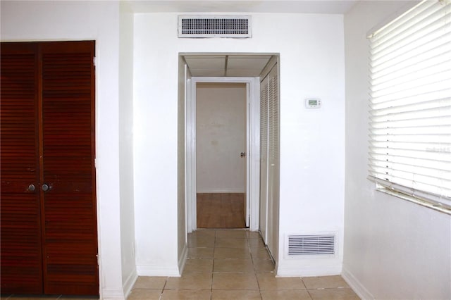 101 Cambridge Trl Unit 194, Sun City Center, FL 33573 - hallway with baseboards and light tile patterned floors