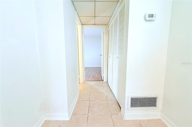 101 Cambridge Trl Unit 194, Sun City Center, FL 33573 - corridor featuring light tile patterned flooring and baseboards