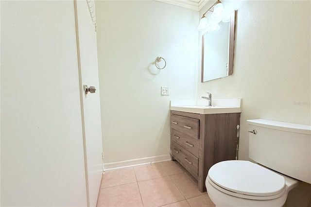 101 Cambridge Trl Unit 194, Sun City Center, FL 33573 - bathroom featuring toilet, vanity, tile patterned flooring, crown molding, and baseboards