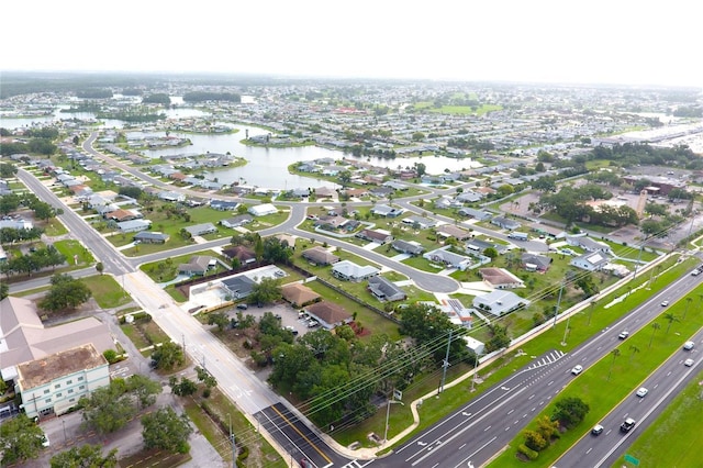 101 Cambridge Trl Unit 194, Sun City Center, FL 33573 - aerial perspective of suburban area with a large body of water
