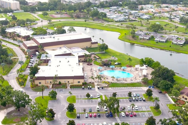 101 Cambridge Trl Unit 194, Sun City Center, FL 33573 - aerial view of property and surrounding area with a nearby body of water and a pool area