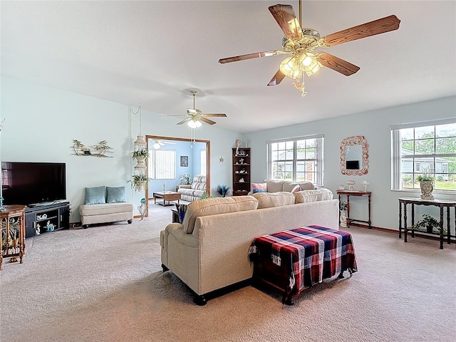 5755 Yorkshire Dr, Zephyrhills, FL 33542 - living area with light colored carpet and ceiling fan