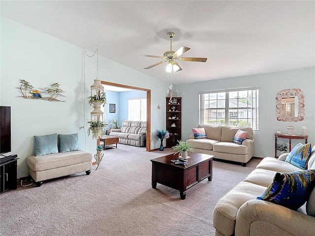 5755 Yorkshire Dr, Zephyrhills, FL 33542 - living room featuring carpet flooring, ceiling fan, and lofted ceiling