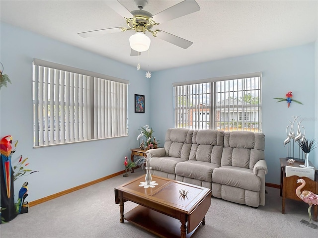 5755 Yorkshire Dr, Zephyrhills, FL 33542 - carpeted living area featuring baseboards and ceiling fan