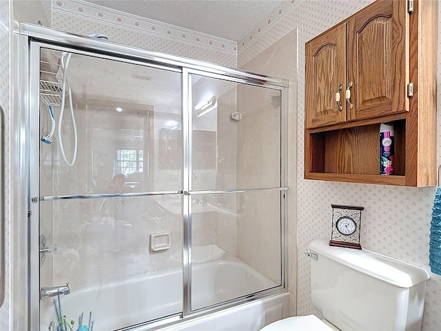 5755 Yorkshire Dr, Zephyrhills, FL 33542 - full bath with wallpapered walls, bath / shower combo with glass door, and a textured ceiling