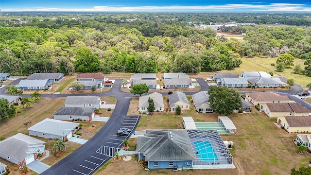 5755 Yorkshire Dr, Zephyrhills, FL 33542 - aerial view of residential area featuring a forest