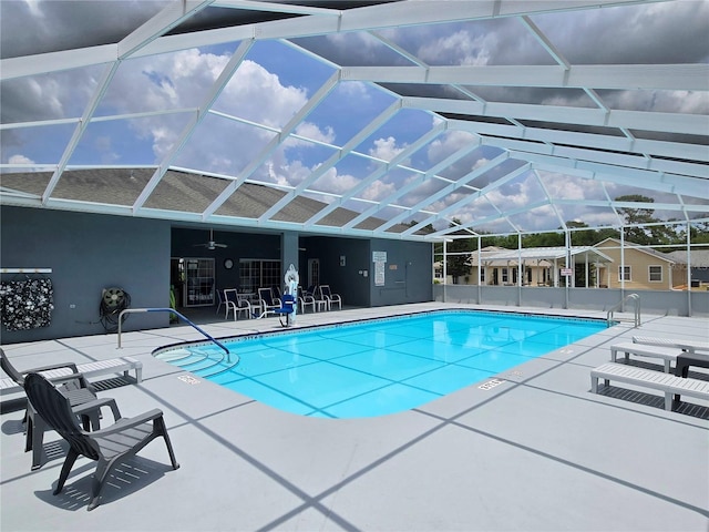 5755 Yorkshire Dr, Zephyrhills, FL 33542 - swimming pool with a patio area, a ceiling fan, and a lanai