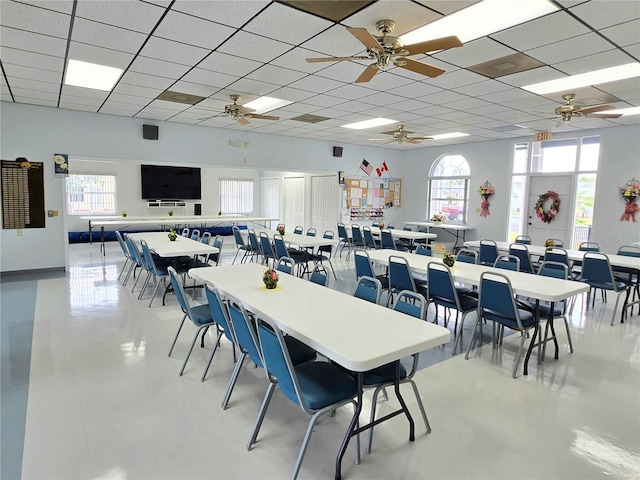 5755 Yorkshire Dr, Zephyrhills, FL 33542 - dining area with ceiling fan, a drop ceiling, and healthy amount of natural light