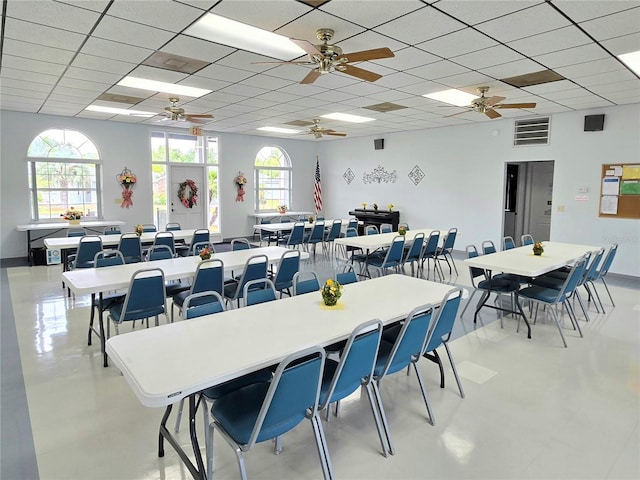 5755 Yorkshire Dr, Zephyrhills, FL 33542 - dining room featuring ceiling fan and a drop ceiling