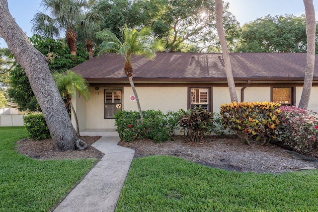 1380 Azalea Dr Unit 1701, Dunedin, FL 34698 - view of front of house featuring stucco siding