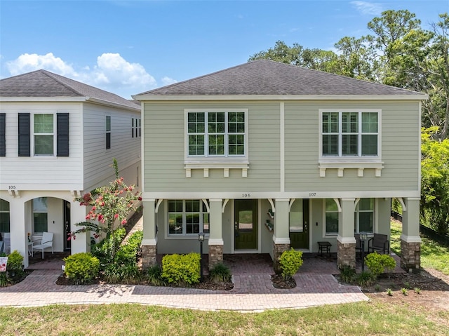 106 Cutlass Way, Oldsmar, FL 34677 - view of front of house with a shingled roof and a patio