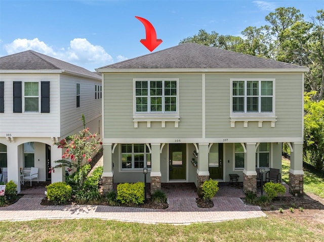 106 Cutlass Way, Oldsmar, FL 34677 - view of front facade with roof with shingles and a patio area