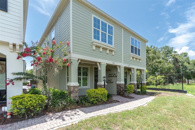 106 Cutlass Way, Oldsmar, FL 34677 - view of front of home featuring stone siding