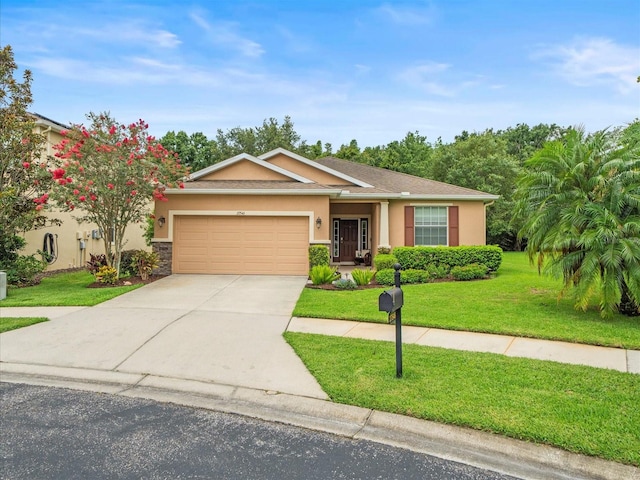 27546 Stonecreek Way, Wesley Chapel, FL 33544 - ranch-style house with an attached garage, stucco siding, a front yard, driveway, and stone siding
