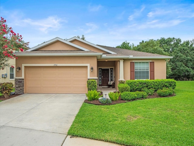 27546 Stonecreek Way, Wesley Chapel, FL 33544 - ranch-style house with stucco siding, a garage, driveway, a front lawn, and stone siding