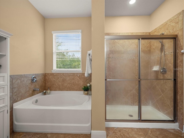 27546 Stonecreek Way, Wesley Chapel, FL 33544 - full bath with a garden tub, a stall shower, and tile patterned floors