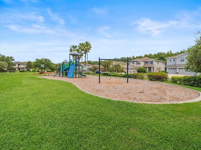 27546 Stonecreek Way, Wesley Chapel, FL 33544 - communal playground featuring a lawn and a residential view