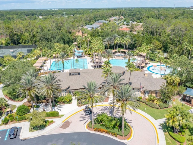 27546 Stonecreek Way, Wesley Chapel, FL 33544 - drone / aerial view of a pool area and a forest