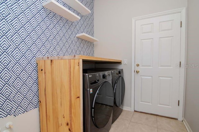 5916 Tulip Flower Dr, Riverview, FL 33578 - washroom with washing machine and dryer and light tile patterned floors
