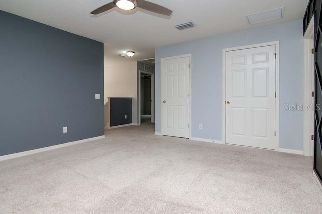 5916 Tulip Flower Dr, Riverview, FL 33578 - unfurnished bedroom featuring carpet, attic access, and a ceiling fan